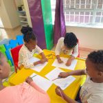 Children writing in class