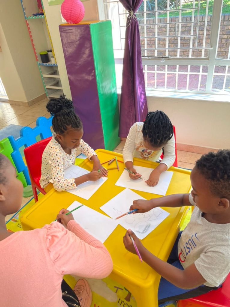 Children writing in class